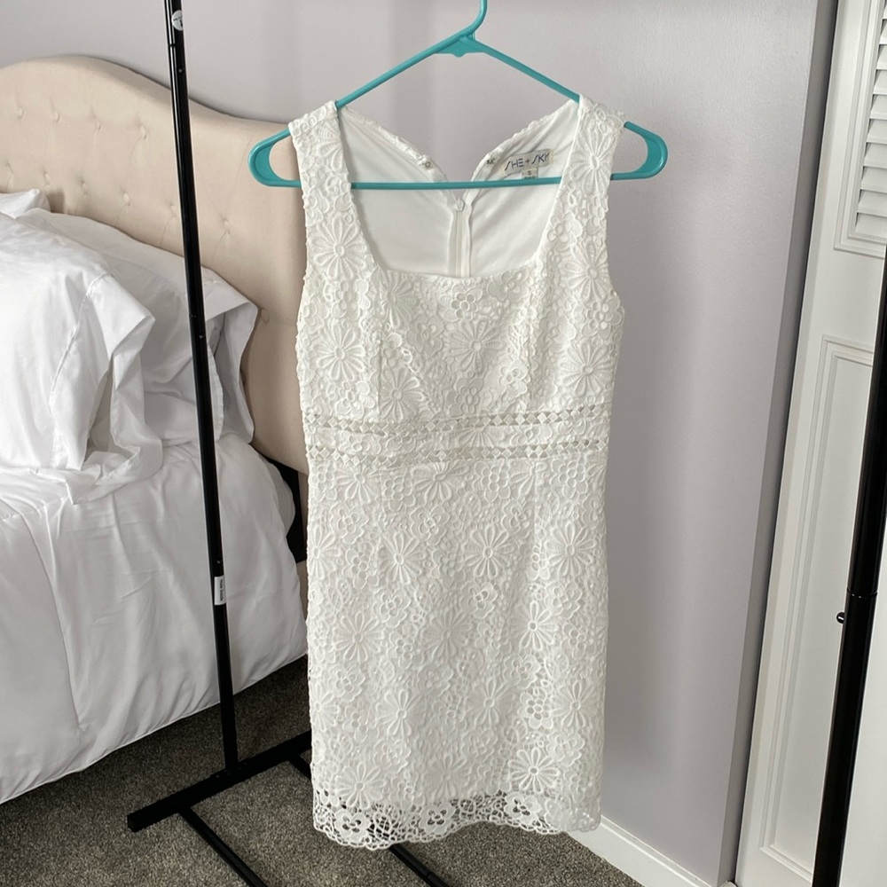 White mini dress with floral print